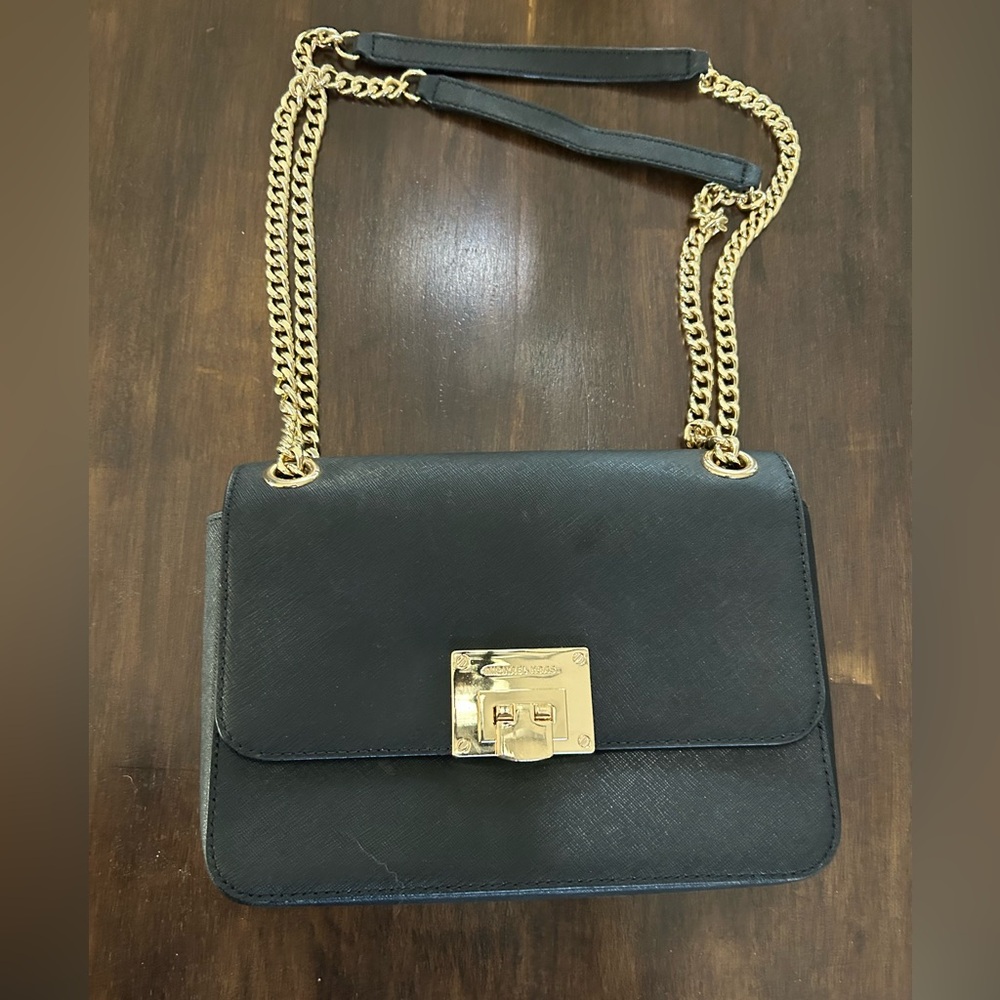 Black and gold Michael Kors Bag.